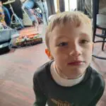 11 AT