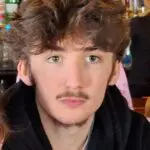 9 AT
