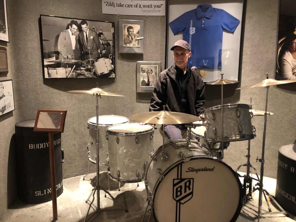 Pete Sweeney - drummer behind drum kit