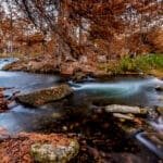 Dark,Silky,Flowing,Waterfalls,Along,The,Guadalupe,River,Surrounded,By